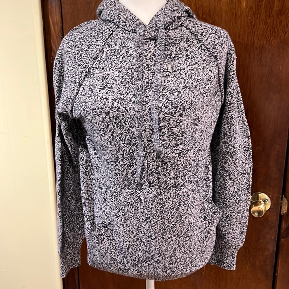 Dark blue and white sweater with hood.  Cotton and nylon material.